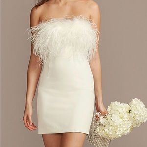Brand new white feather trimmed dress